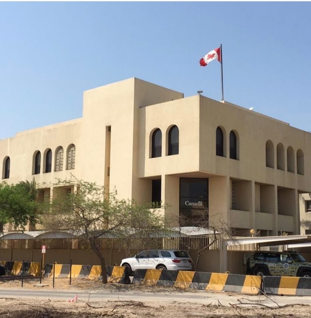 An embassy with a Canadian flag.